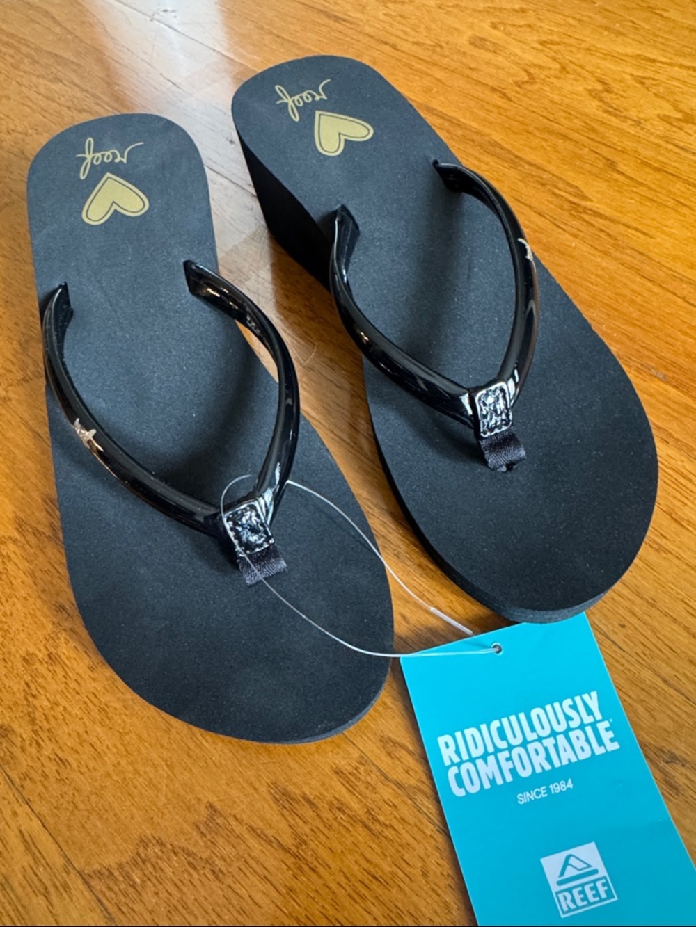 NEW Reef Black Wedge Flip Flop Sandals with Gold Heart Accent